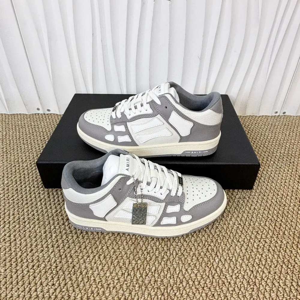 Amiri Skel Top Low In White and gray color matching