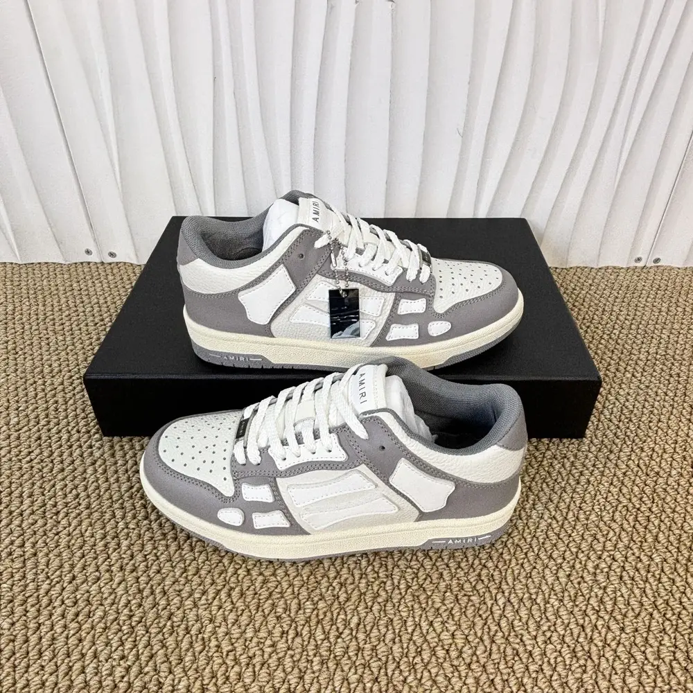 Amiri Skel Top Low In White and gray color matching