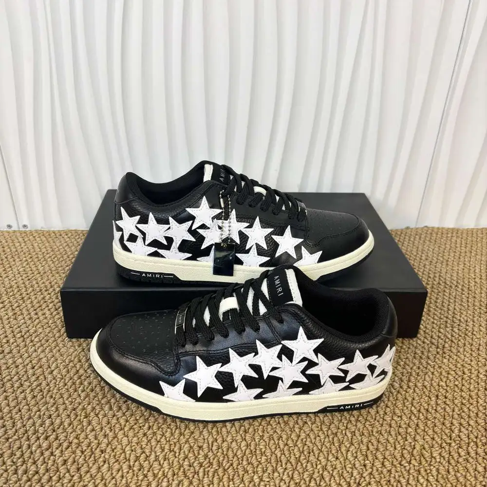 Amiri Skel Top Low black and white star patch low-top sneakers