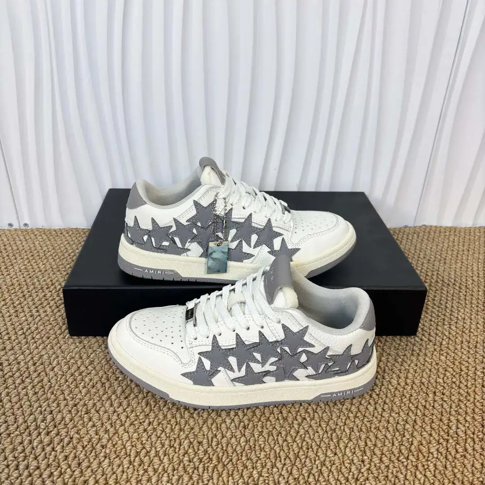 Amiri Skel Top Low grey and white star patch low-top sneakers