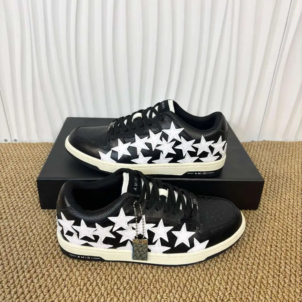 Amiri Skel Top Low black and white star patch low-top sneakers
