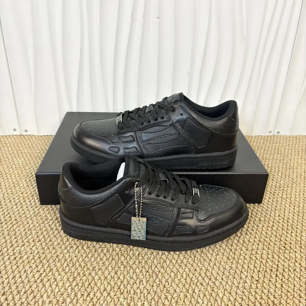 Amiri Skel Top Low In Triple Black